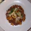 Una foto de Rigatoni Bolognese de un restaurante