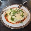 Una foto de Chicken Parmesan de un restaurante