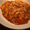 A photo of Fettucine Bolognese of a restaurant