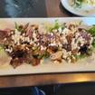 Una foto de Beet and Goat Cheese Salad de un restaurante