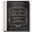 Una foto de Just a Few Miles South Cookbook by Ouita Michel de un restaurante