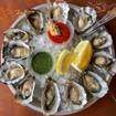 A photo of Oysters, Nibbles, and Happy Hour Giggles! of a restaurant