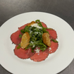 Una foto de Carpaccio de un restaurante