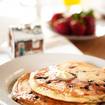 A photo of BLD RICOTTA BLUEBERRY PANCAKES of a restaurant