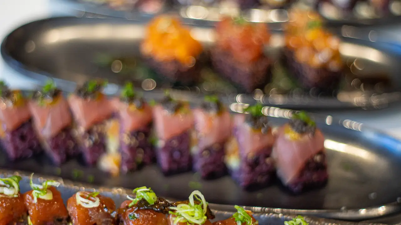 Black rice sushi with tuna, salmon, and avocado - Friends Sushi On State, Chicago, IL
