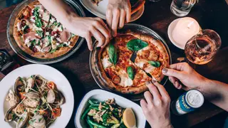 Una foto del restaurante Compass Pizza