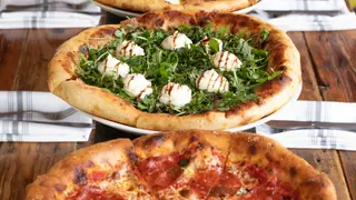 A photo of Pie Tap Pizza + Rotisserie + Bar - Magnolia restaurant