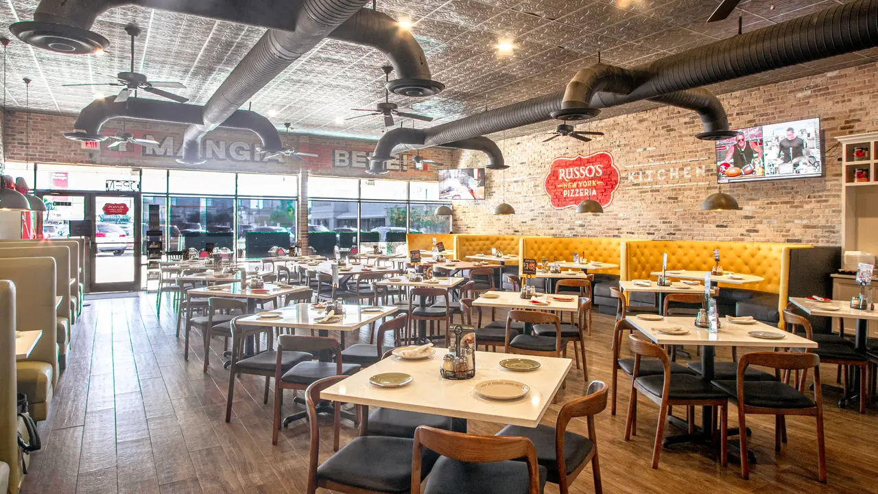Newly redesigned interior with new furniture...  - Russo’s New York Pizzeria - Galleria, Houston, TX