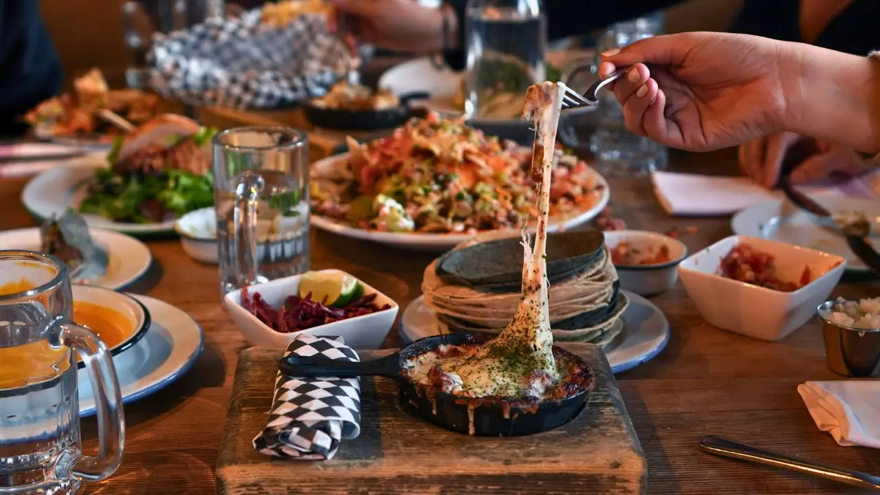 Mad Mexican Choriqueso and Signature Nachos - Mad Mexican Restaurant, Toronto, ON