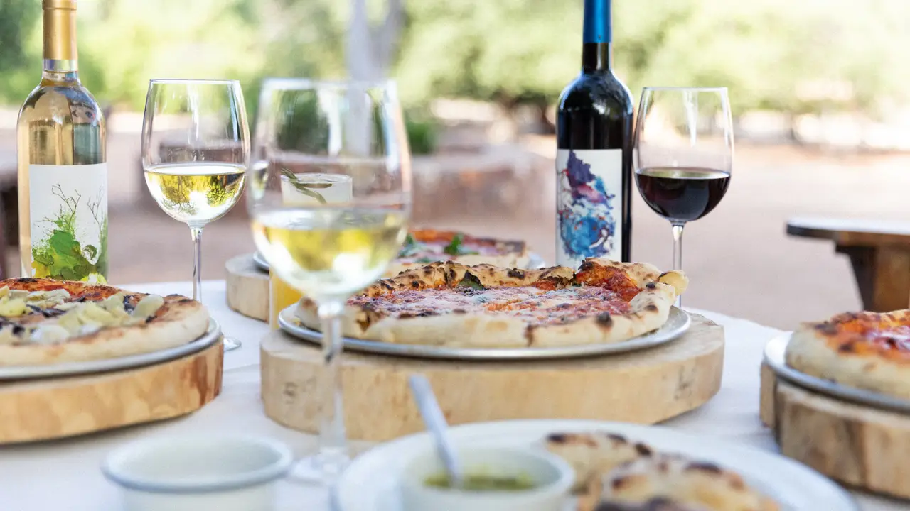 Enjoy dining al fresco at our country kitchen - The Deck at Enkanto BCN Villa de Juárez