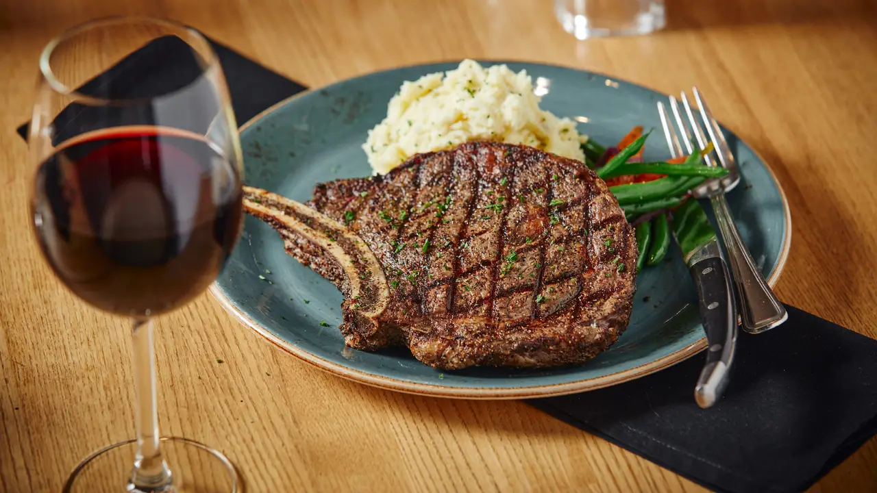 16oz Bone-In Rib Steak - Milestones Grill + Bar - Royal Oak, Calgary, AB