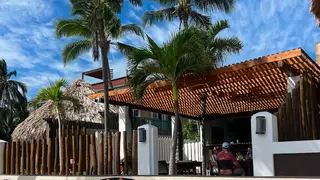 Una foto del restaurante Tropical Escape Restaurant & Bar