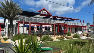 Una foto del restaurante Crabbys Beachside