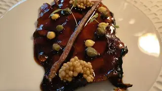 Una foto del restaurante Local de Ensayo