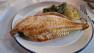 Una foto del restaurante La Pequeña Taberna
