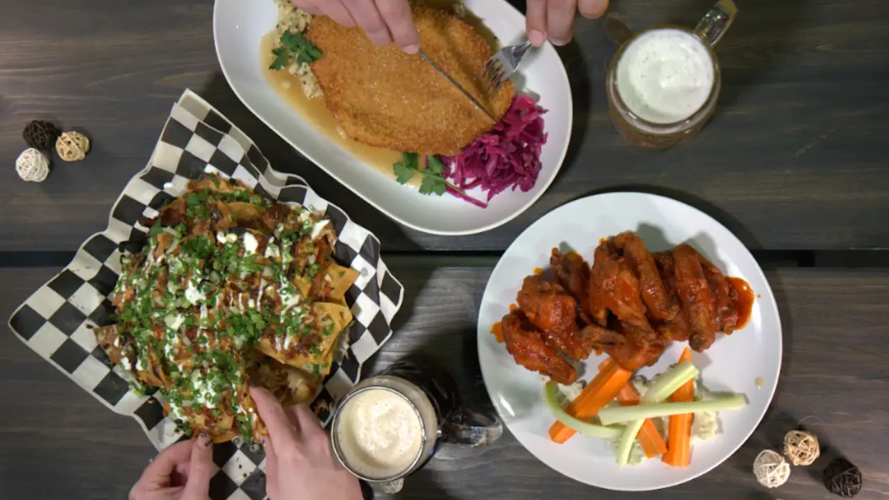 nachos, schnitzel and chicken wings - Newark Brewing: Bar & Restaurant, Beamsville, ON