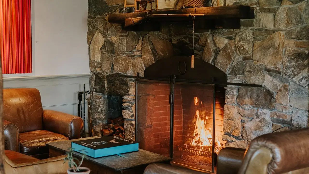 Seat in front of the fireplace - Maggie’s Tavern at Winvian, Morris, CT
