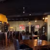 A photo of house. wine. & bistro. restaurant