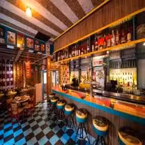 A photo of Miss Lily's 7A restaurant