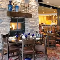 A photo of Downtowner Woodfire Grill restaurant