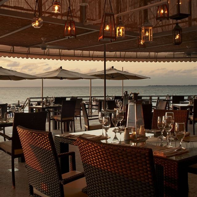 Veranda oceanfront fine dining restaurant at Grand Cayman Marriott Resort with elegant ambience for romantic dinners on Seven Mile Beach