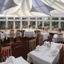 A photo of India on the green restaurant