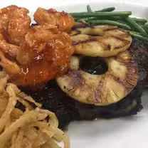 A photo of Woody's Tupelo Steakhouse restaurant