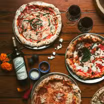 A photo of Dodici Pizza and Wine restaurant