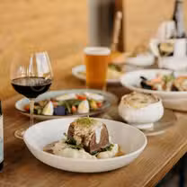 A photo of Bushel and a Peck Kitchen & Bar restaurant