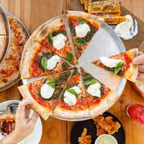 A photo of UNA pizza + wine Calgary: Broadcast restaurant
