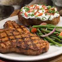 A photo of Tahoe Joe's Famous Steakhouse - Visalia restaurant