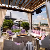 A photo of Myrtle & Rose Rooftop Bar at Plant Riverside District restaurant