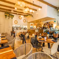 Foto von Coco Canela Town Square Restaurant