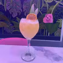 Una foto del restaurante Coasis Restaurant Bar & Suites