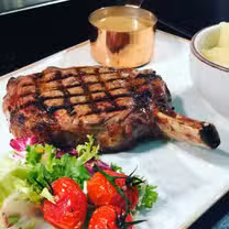 Foto von Steak Lounge and Grill Restaurant
