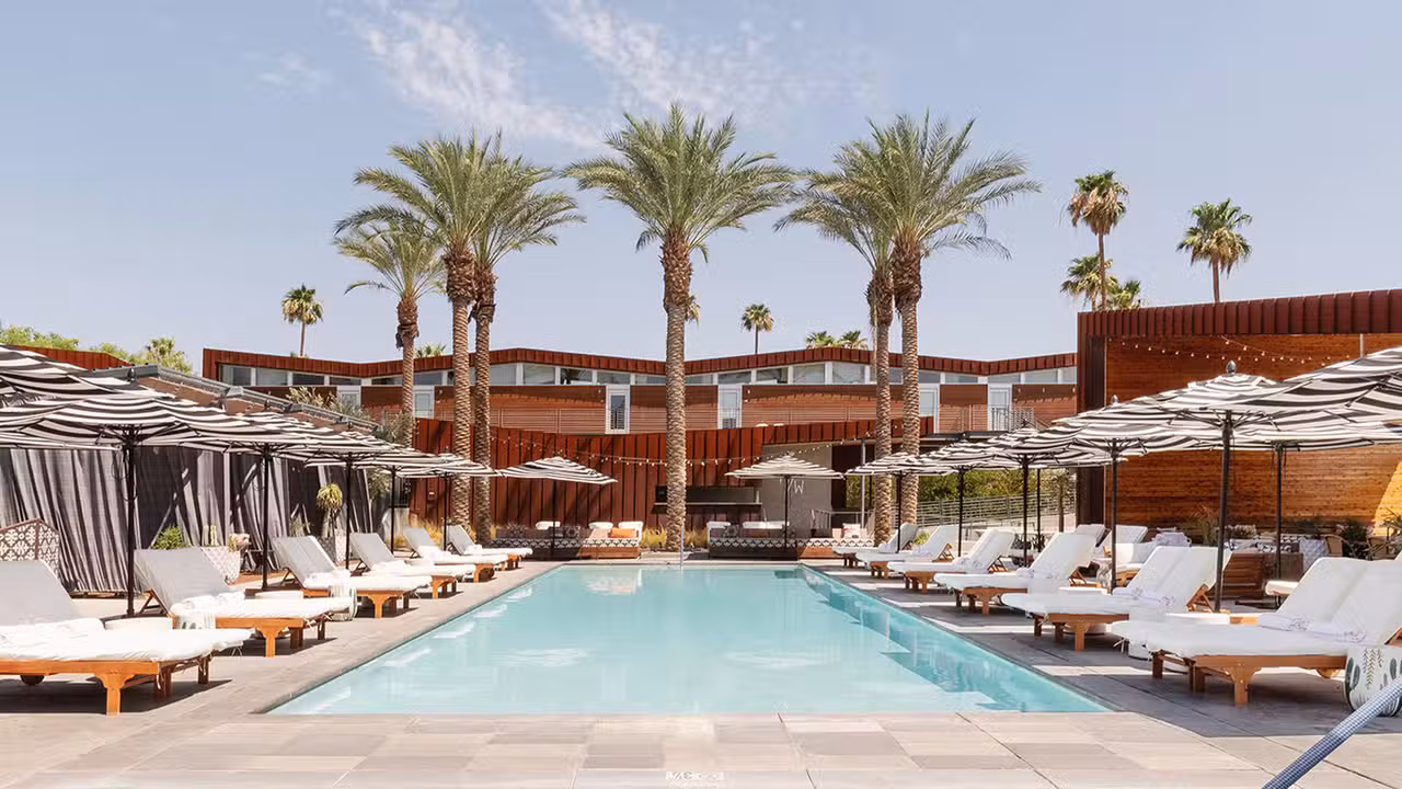 Palm Canyon Swim &amp; Social pool area with cabanas - Palm Canyon Swim & Social, Palm Springs, CA