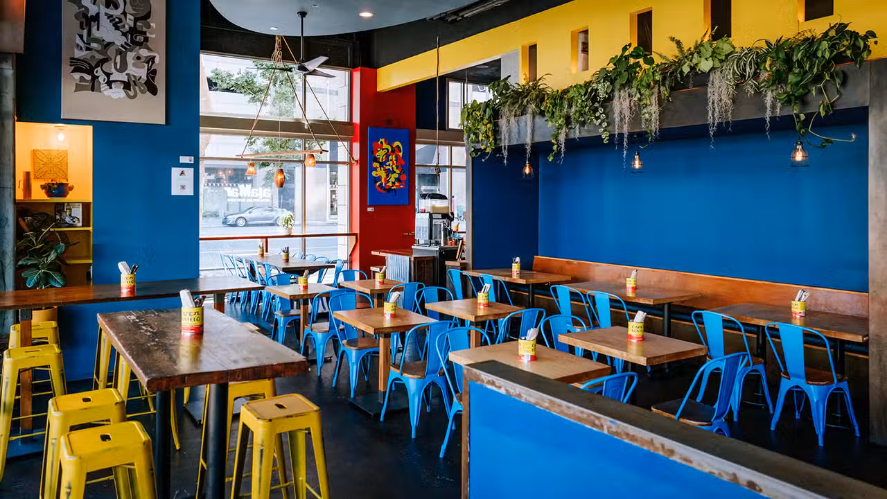 man sitting at bar - alaMar Dominican Kitchen CA Oakland
