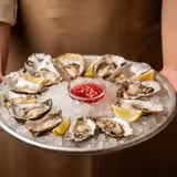 £1.50 Oyster Happy Hour and £8.00 Chapel down photo