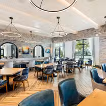 A photo of Wolfgang Puck Kitchen + Bar, The Brownwood Hotel & Spa restaurant