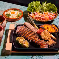 A photo of Que Barbaro at Level 8 restaurant