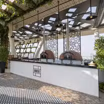 Foto von Brick Rooftop Kitchen & Bar - Aloft Abu Dhabi Restaurant