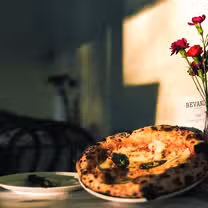 A photo of Paesino Pizzeria restaurant