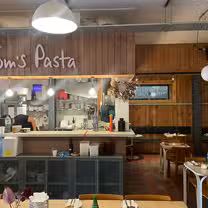 A photo of Tom's Pasta restaurant
