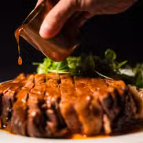 A photo of CHARCUT University District restaurant