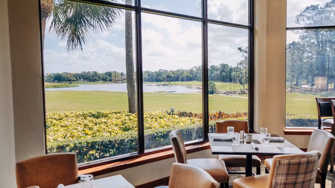 View of golf course from inside restaurant - Grove House at Mission Resort, Howey-in-the-Hills, FL