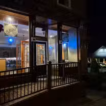 A photo of Larry's Steaks & Crepes Presented by AC Bistro restaurant
