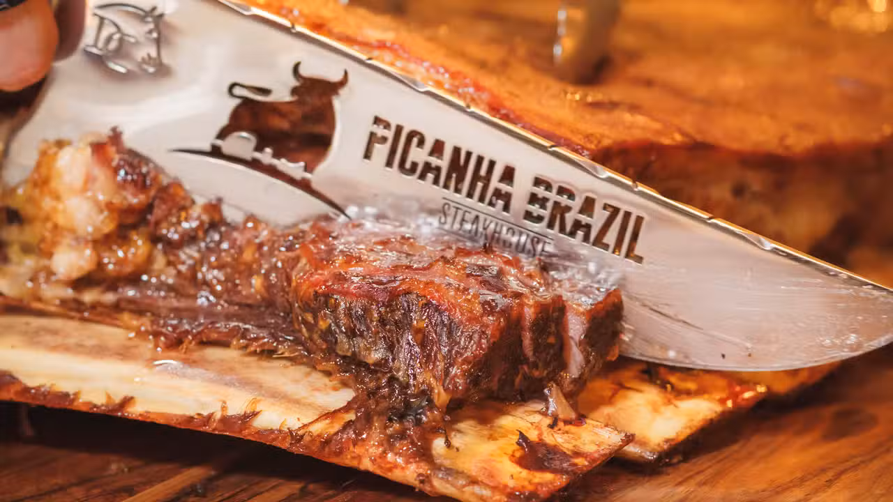 Beef ribs being served table side. - Picanha Brazil Steakhouse, Margate, FL
