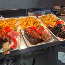 A photo of Red's Brisket Pit restaurant