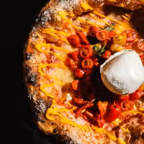 A photo of L’ Artista | neapolitan pizza restaurant