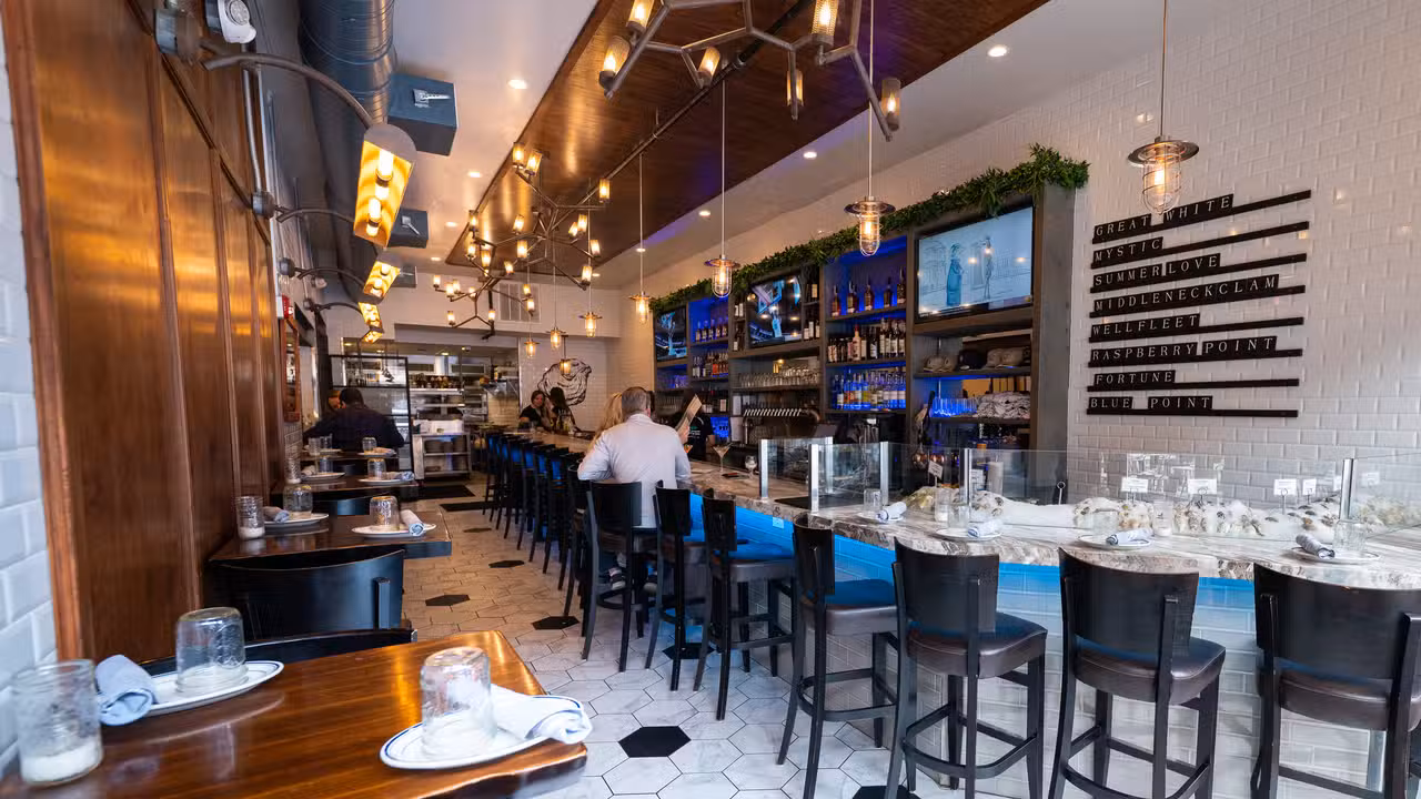 Bar High tops &amp; Raw Bar Seating Area - Greystone Oyster Bar, West Chester, PA